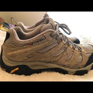 Size 10 Merrell Hiking shoes. Likely never worn outside. Like new.